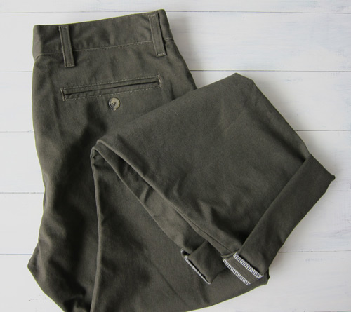 Men's olive chinos folded