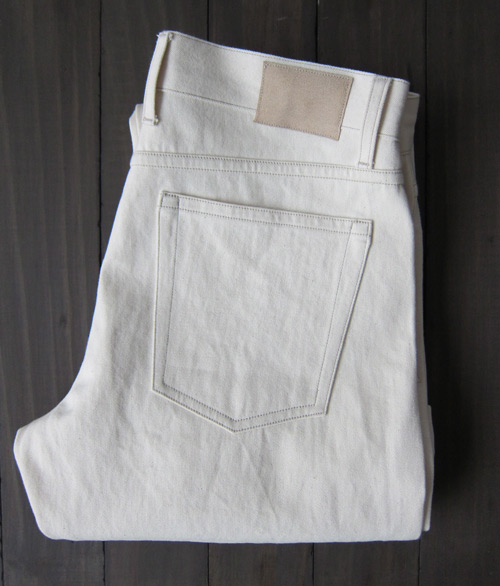 cream colored natural selvedge denim folded