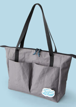 Tess Tote sewing pattern, front view showing exterior billow pocket and handles